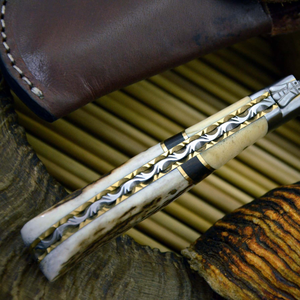 Cuchillo Plegable Imperial de Acero de Damasco con Hoja de Punta Caída y Mango de Marfil para Caza - Product Image 6