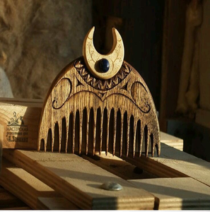 Traditional <b>wooden</b> hair comb intricately <b>carved</b> with openwork cherry blossoms along the spine, available at wholesale prices. - Product Image 4