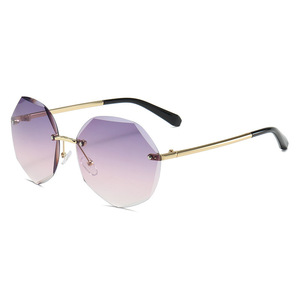 Lunettes de soleil rondes sans monture, style moderne, métalliques, anti-UV, pour femmes, idéales pour les voyages et la plage. - Product Image 6