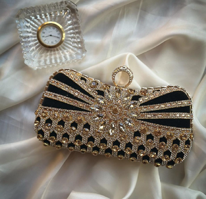 Exquisite half-moon crystal clutch with floral vine patterns and a jewel clasp. Divine. Available at wholesale prices - Product Image 2