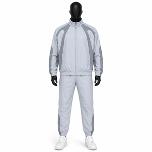 Ensemble de survêtement coupe-vent gris clair pour homme, léger, avec blocs de couleur, veste zippée intégrale et pantalon de jogging, logo personnalisé OEM - Product Image 1