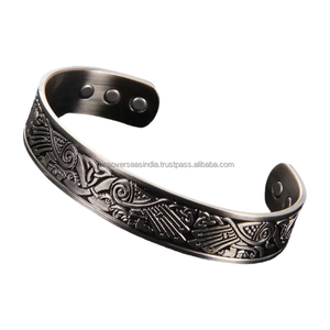 Brazalete curativo ajustable de diseño en relieve clásico de alta calidad con imanes ultrarresistentes para mujeres y hombres a un precio asequible - Product Image 5