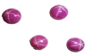 Rubis étoilé ovale 9x11 mm 4,5 carats, créé en laboratoire, poli, opaque, cabochon avec effet étoile à 6 branches pour la fabrication de bijoux - Product Image 6