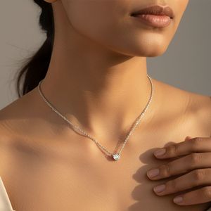 Collier solitaire serti clos en or plaqué 10 carats avec diamant de laboratoire rond brillant de 0,25 carat total - Product Image 1