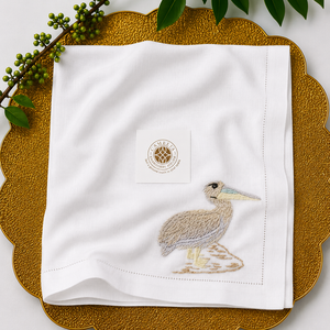 Linen napkin with heron, elegant <b>stitching</b> evokes calm, refined dining style. - Product Image 1