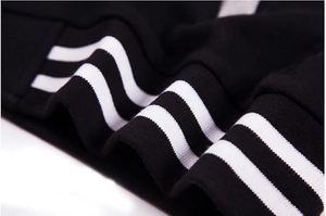 Chaqueta Varsity para Hombre en Blanco y Negro con Bloques de Color, Cuello Alto y Botones a Presión, Estilo Béisbol - Product Image 5