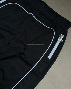 Chándal cortavientos reflectante 3M personalizado de fábrica OEM y pantalones de nailon para hombre - Product Image 3