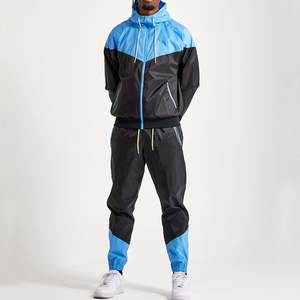 Ensemble de survêtement deux pièces en nylon et polyester pour homme, coupe-vent et isolant, idéal pour l'hiver - Product Image 1