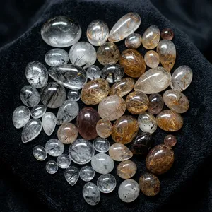BAITHU GEMS MINERALS พลอยอะความารีนธรรมชาติหลากสีสวยงาม รูปทรงคาโบชอง สีขาว ดำ ทอง ขัดเงา ปรับแต่งได้ตามต้องการ - Product Image 1
