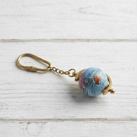 Porte-clés globe terrestre en laiton antique, carte du monde rotative, souvenir de voyage, cadeau pour professeur de géographie, porte-clés pour les amateurs d'aventure, vintage