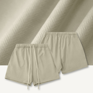 Pantalones cortos tipo bermuda de algodón de color liso para hombre con cordón en la cintura y bolsillos estilo casual - Product Image 3