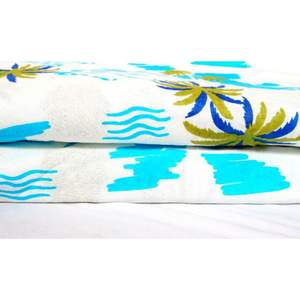 Tela de algodón orgánico con hermoso estampado a mano y colores vibrantes, ligera, con estampado isleño para camisas y cortinas para niños. - Product Image 5