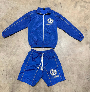 Ensemble de survêtement en satin bleu pour homme OB avec logo brodé, sportif, été, séchage rapide, haut à manches courtes et short - Product Image 1