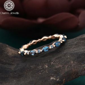 Charm_Jewells Rose Gold Eternity <b>Band</b> <b>Ring</b> with Cushion Cut Blue Moissanite Prong Setting Women's Classic Engagement <b>Ring</b> - Product Image 6