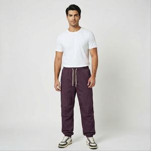 Pantalones informales de gran tamaño para hombre OEM, pantalones de chándal para hombre, pantalones de poliéster de nailon liso, pantalones de trabajo para correr para hombre - Product Image 1