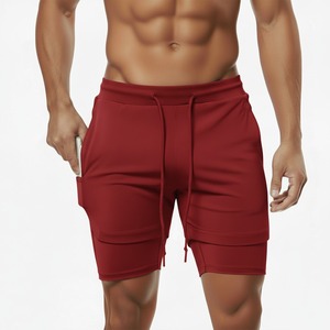 Shorts de sport 2-en-1 pour homme, couleur unie, avec cordon de serrage à la taille, vêtements de sport performants pour la remise en forme - Product Image 1