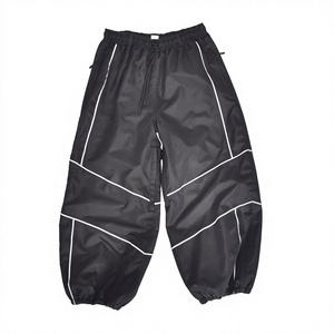Pantalon de ski unisexe noir en polyester/nylon avec cordon de serrage, respirant, avec isolation en polaire technique, taille adulte, coupe ample et élastique - Product Image 1