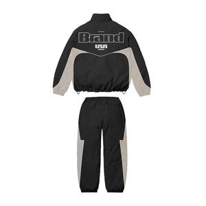 Jogging en nylon personnalisé vestes zippées pantalons de survêtement deux pièces polyester respirant ensemble coupe-vent vêtement imprimé d'hiver - Product Image 2