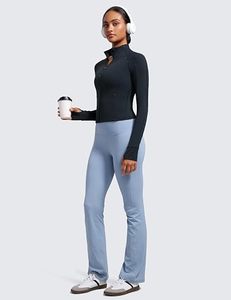 Vêtements de sport pour femmes, noirs, à demi-zip, manches longues, couleur unie, respirants, en polyester et élasthanne, coupe ajustée, col montant, avec poches - Product Image 1