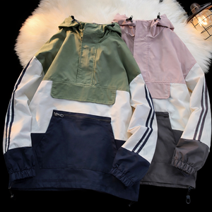 Chaqueta cortavientos unisex ligera con capucha, bloques de color y bolsillo canguro. - Product Image 4