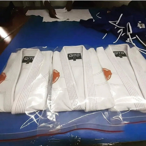 BJJ GI เครื่องแต่งกายเสริมความแข็งแรงผ้าฝ้าย100% 450กรัมแห้งเร็วระบายอากาศทนทานใช้ได้ทั้งชายและหญิงผลิตจากโรงงานถักทอ - Product Image 6