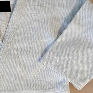 Kimono de judo unisexe de haute qualité, tissu 550g, durable, respirant, séchage rapide, uniforme d'arts martiaux avec broderie de logo personnalisée - Product Image 4