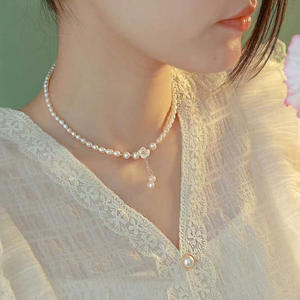 Collier à pampilles petites fleurs en perles d'eau douce naturelles et perles de millet en argent S925, design style chinois chic pour mariées et occasions spéciales - Product Image 3