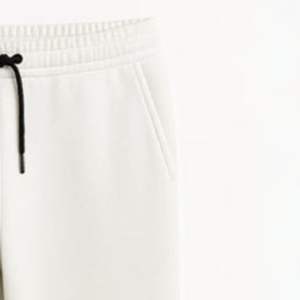 กางเกงวอร์มผ้าฝ้ายผสมไนลอนสั่งตัดไซส์ได้ แห้งเร็ว ไม่ยับ ไม่เป็นขุย ดีไซน์ทรงคาร์โก้ขาบาน รับผลิตแบบ OEM ODM - Product Image 4