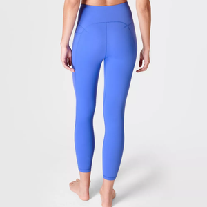 Leggings de yoga de color liso para mujer, de cintura media, elásticos en cuatro direcciones, con control de abdomen y efecto fruncido en glúteos, ideales para gimnasio y deportes variados, venta al por mayor. - Product Image 3