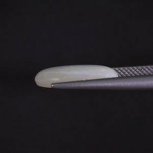 โอปอลธรรมชาติสีขาวรับรองโดย IGI น้ำหนัก 3.41 กะรัต รูปทรงวงรี ขนาด 15.5x9.5 มม. ตัดด้วยมือ ขัดเงา ผ่านการเคลือบแว็กซ์/น้ำมัน - Product Image 2