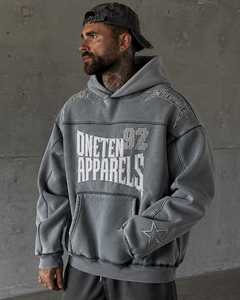 เสื้อฮู้ดโอเวอร์ไซส์ผ้าฟลีซหนานุ่มสำหรับผู้ชาย ยี่ห้อ ONETEN APPARELS สีเทา สไตล์สตรีทแวร์ พิมพ์ลายโลโก้ด้านหน้า มีกระเป๋า - Product Image 3