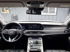รถ SUV มือสองสีขาว ปี 2022 รุ่น Palisade เครื่องยนต์ดีเซลเทอร์โบ เกียร์อัตโนมัติ ฝากระโปรงท้ายไฟฟ้า เบาะไฟฟ้า รถมือสองจากเกาหลี ไฟ LED ระบบ LDWS ระบบ AEB - Product Image 3
