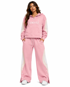Ensemble coordonné en polaire zippé pour femme avec sweat à capuche à poche et détails latéraux à boutons-pression, et pantalon de survêtement coupe ample – Fournisseur en gros - Product Image 5
