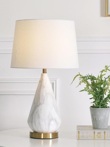 Designer Accent Lighting Piece Featuring Sculptural Curved Form Warm Light Distribution And Refined Modern Interior Character - Product Image 3