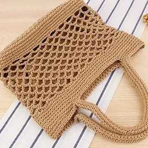 Le sac artisanal s'intègre parfaitement aux collections de mode décontractées, côtières, rustiques et bohèmes-chic. - Product Image 1