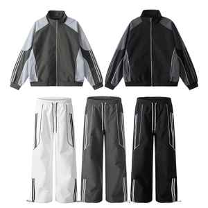 Survêtement coupe-vent avec panneaux réfléchissants de différentes couleurs, pantalon et veste, 100% polyester, imperméable, sportif, léger pour l'hiver - Product Image 1