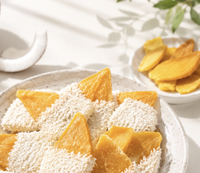 Délice de mangue vietnamienne authentique avec chocolat blanc et noix de coco, inspiré des saveurs des îles tropicales