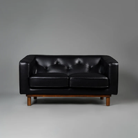 Canapé Chesterfield de luxe à une place en cuir véritable, fauteuil capitonné avec accoudoirs roulés, structure en bois massif, salon classique rectangulaire