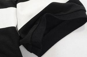 เสื้อโปโลแขนสั้นสีน้ำเงินกรมท่าสำหรับผู้ชาย ทรงปกติ สวมใส่สบาย สีพื้น ผ้าทอ - Product Image 2