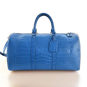 Nuevo bolso de viaje informal para hombre de cuero genuino, impermeable, en oferta en línea a bajo precio. - Product Image 6
