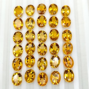 พลอยซิทรินธรรมชาติทรงรีขนาด 9x7 มม. เจียระไนเหลี่ยม สีเหลืองทอง สำหรับทำเครื่องประดับ ขายส่ง HASNAIN GEMS - Product Image 1
