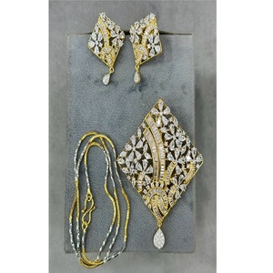 <b>Pretty</b> Gold Finish Designer CZ Stones Look With Chain Pendent Set with <b>Earrings</b> for Wedding Parties Wear Collection For Women - Product Image 1