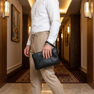 Bolso de mano de cuero premium para negocios con organizador, compartimento para documentos, ranuras para tarjetas, bolsillo para teléfono y correa desmontable en venta. - Product Image 1