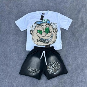 ชุดเซ็ตแทรคสูทลำลองผู้ชายแฟชั่นสีดำขาว ผ้าฟลีซมีฮู้ด ซิปหน้า ทรงโอเวอร์ไซส์ ปักอักษรสีเหลืองตามสั่ง - Product Image 3