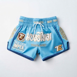 Pantalones Cortos de Muay Thai Trade Excel para Hombre, Azules, Bordados, de Satén, de Secado Rápido, Casuales, con Cintura Elástica, 100% Poliéster, Logotipo Frontal - Product Image 1