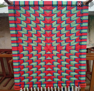 Large <b>metal</b> <b>frame</b> charpai <b>bed</b> featuring a bold red and <b>white</b> geometric woven web design, available at wholesale prices. - Product Image 4