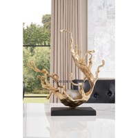 Sculpture métallique abstraite de designer, robuste, de forme irrégulière, faite à la main, art contemporain, décoration pour salon, présentation sur table.