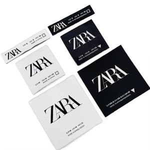 Etiquetas de Tela Tejida con Logotipo Personalizado, Impresas, de Satén/Algodón/Poliéster, Plegadas, de Alta Calidad para Ropa, Sombreros y Bolsos - Product Image 1