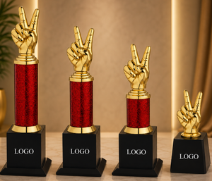 Trofeo de Mano con Símbolo de Paz Chapado en Oro con Columna Roja y Base Negra para Actividades Promocionales con Temática Musical - Product Image 1