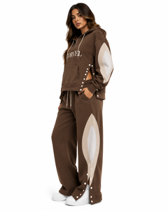 Ensemble coordonné en polaire zippé pour femme avec sweat à capuche à poche et détails latéraux à boutons-pression, et pantalon de survêtement coupe ample – Fournisseur en gros - Product Image 2